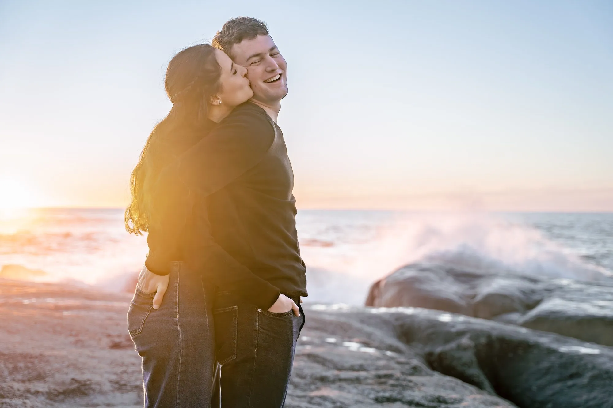 A couple in a quiet embrace during their engagement session in Cape Town