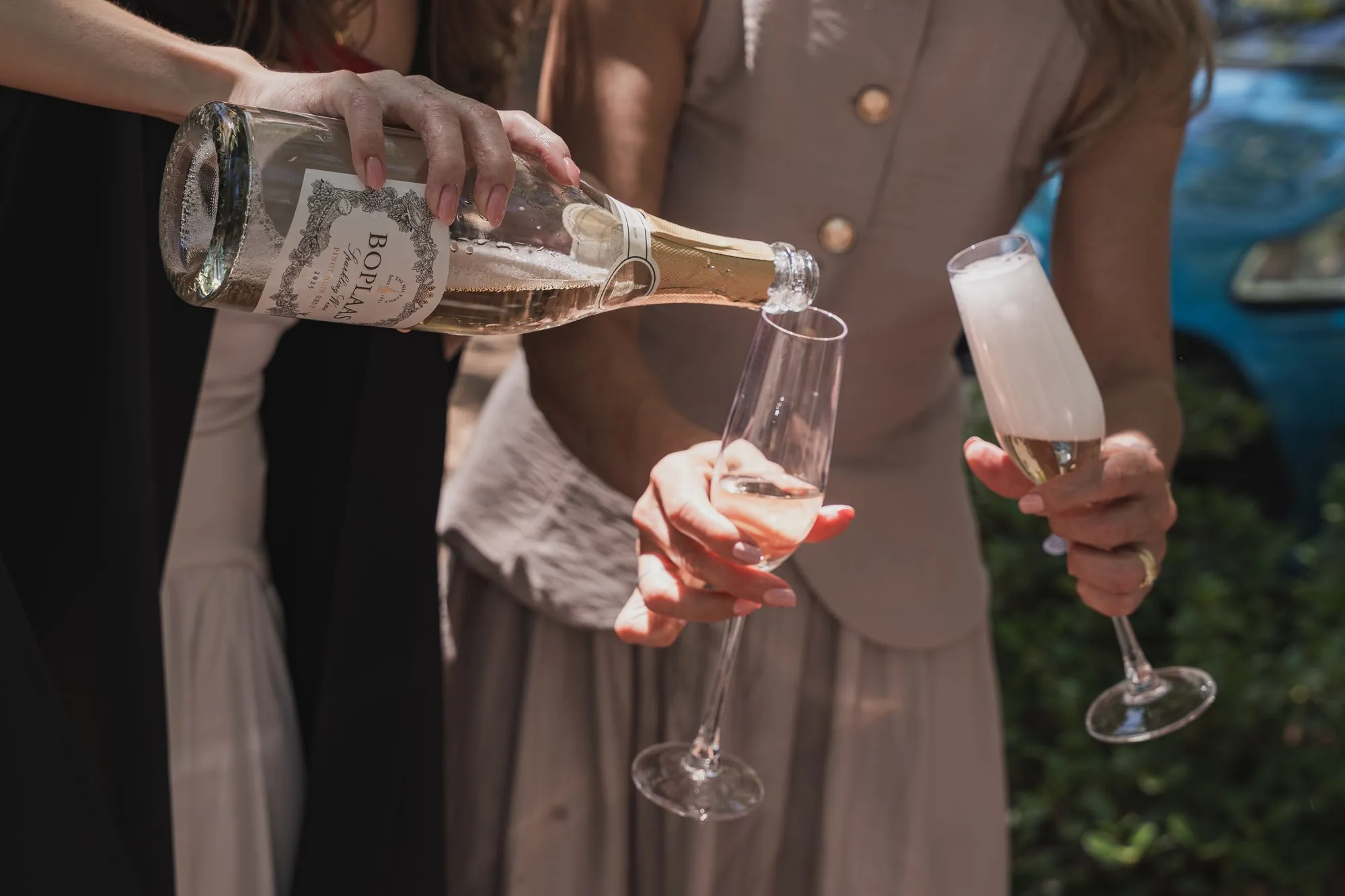 Sparkling wine poured in celebration after the ceremony