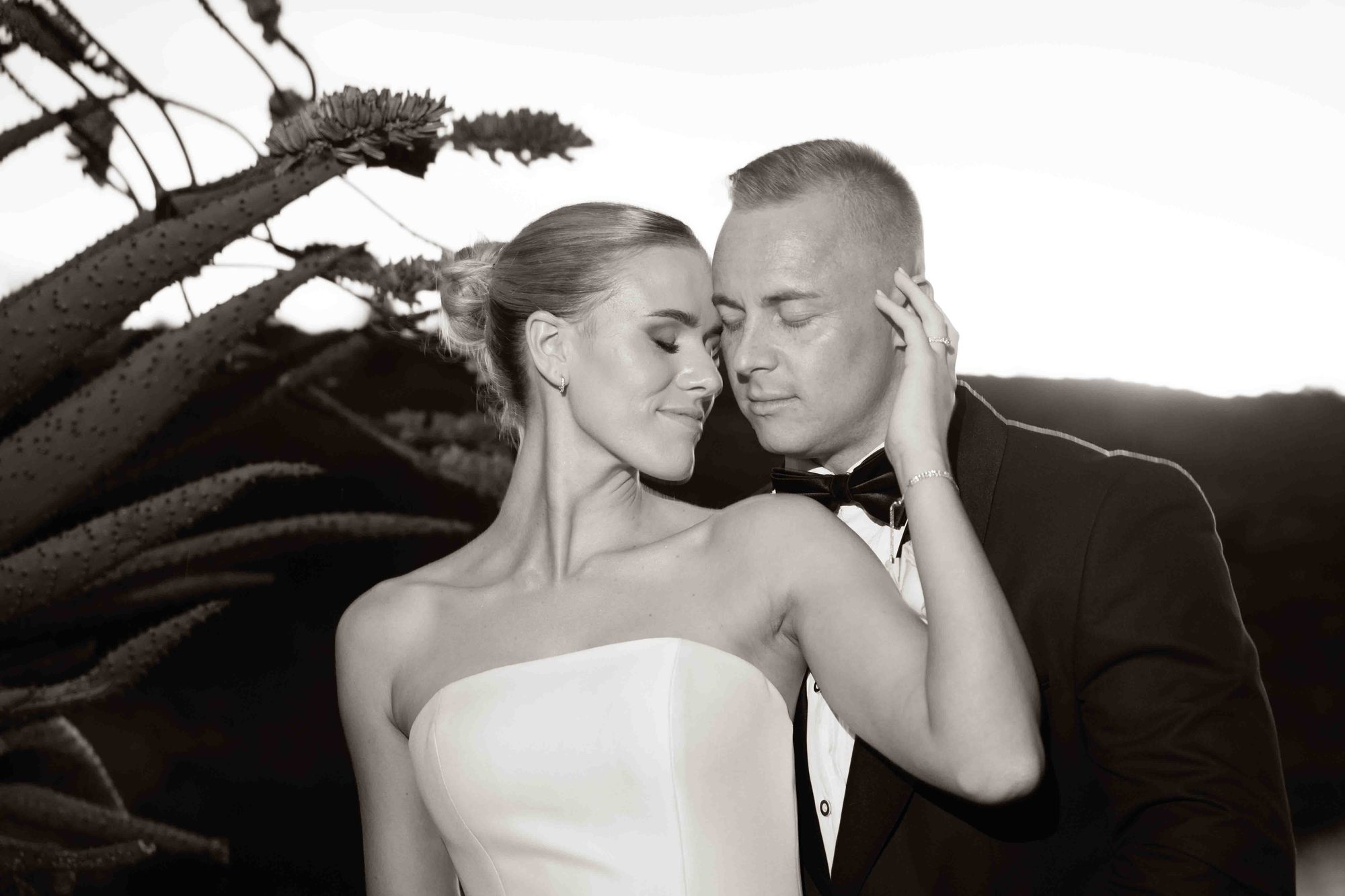 A couple cheek to cheek, in black and white